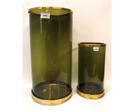 A large Ralph Lauren green glass hurricane lamp and another smaller Condition Report: Available upon request