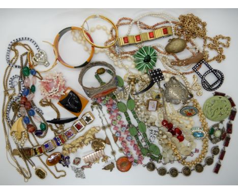 A Chinese white metal and enamel bangle set with a carnelian, vintage beads and other vintage items Condition Report: Not ava