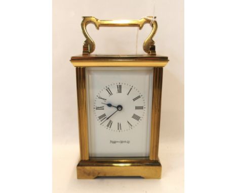 A Mappin and Webb Ltd brass and glass carriage clock Condition Report: Available upon request