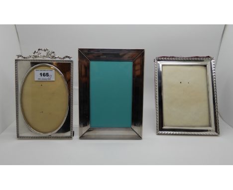 A lot comprising a white metal mounted photo frame marked Tiffany &amp; Company, Italy, 17.7cm x 12.7cm, aperture 13.2cm x 8.