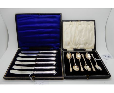A lot comprising a cased set of six silver coffee spoons, Sheffield 1935 and a cased set of silver handled butter knives (2) 