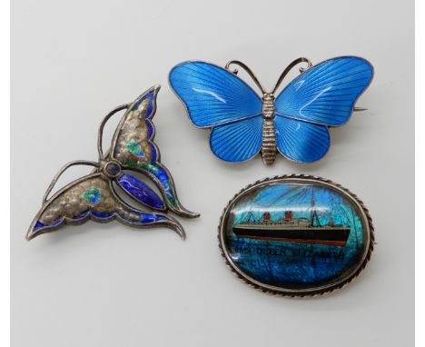 Two silver and enamel butterfly brooches by Charles Horner (af), a Norwegian example by Ivar Holth and a silver brooch of the