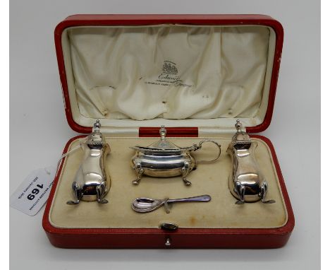 A cased three piece silver condiment set (matched), Chester and Birmingham marks, 103gms Condition Report: - The silver is ok