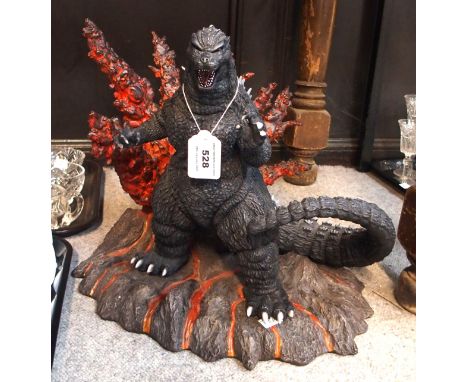 A limited edition sculpture of Godzilla, sculpted by Hector Arce and Ernest Galvez Condition Report: Missing two claws and a 