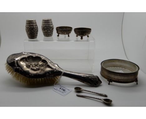 A lot comprising a silver backed brush, Birmingham 1910, a silver framed butter dish, Birmingham 1927 and a four piece Burmes