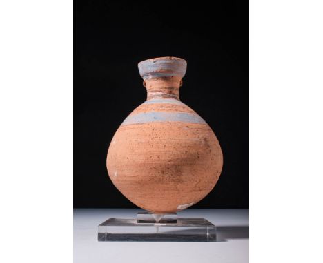 Amarna Period, Ca. 1353 - 1336 BC.
A lovely acorn-shaped vessel with a short cylindrical neck, and sub-vertical rolled rim, t