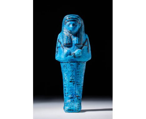 Third Intermediate Period, 21st Dynasty, Ca. 1075 - 945 BC.
An amazing hand-built faience ushabti of Nesytanebetisheru, stand