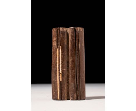 New Kingdom, Ca. 1550-1070 BC.
A wooden case composed of two tubes joined by a reinforcing projection at the top, featuring a