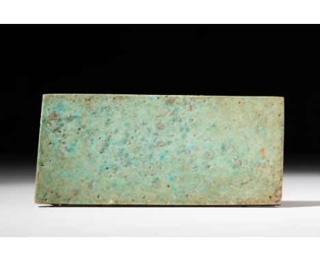 New Kingdom, Ca. 1550 - 1070 BC.
A faience plaque of the conventional type found in foundation deposits of this period. The g