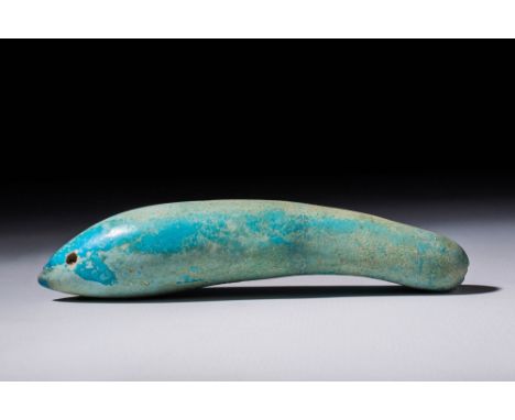 Middle Kingdom, Ca. 2055 - 1790 BC.A pale faience model of cucumber or gourd with an elongated tubular body with regular roun