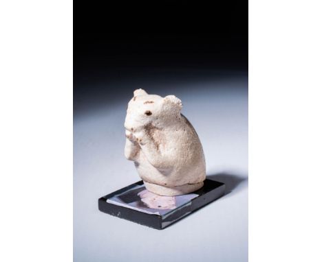 Late Period, Ca. 664 - 30 BC.
An exceptionally rare faience figurine of a standing mouse. Moulded from faience, the mouse sta