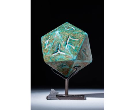 Ca. AD 300 - 400.
A stone 20-sided polyhedral dice inscribed with Greek letters. For similar see: The Metropolitan Museum of 