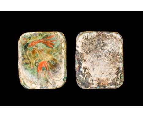 Ca. AD 100 - 200.
A group of two rectangular-shaped plaques of sandwich glass decorated with red flowers with long petals. Th