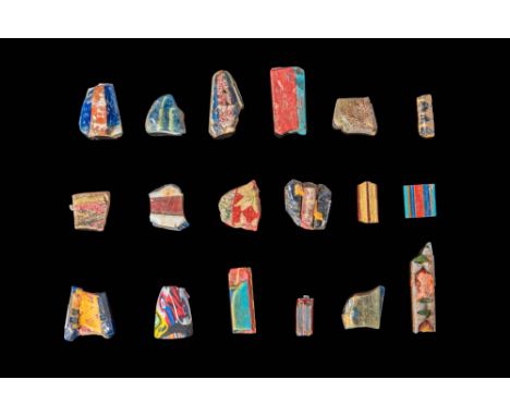 Ca. 30 BC - AD 200.
A set of 18 mosaic glass inlays, all of various sizes and shapes, primarily polychrome. These inlays are 