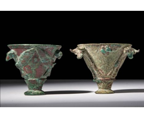 Ca. 2600 - 2200 BC.
A pair of copper cups with conical body. The first cup on the left is decorated with protomes of birds of