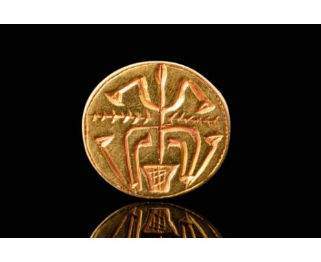 Middle Kingdom, Ca. 2030 - 1850 BC.An oval-shaped, gold button seal featuring a domed, plain back with an underside incised w