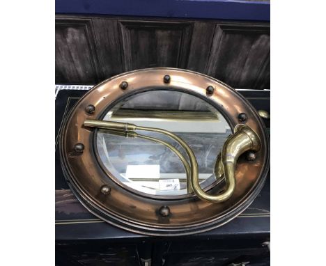 CIRCULAR WALL MIRROR together with brass arts and crafts stand and other brass trench art