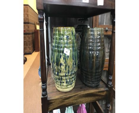 TWO CERAMIC BARRELS together with a large vase and a plaster face bust 