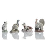 Vier Miniatur-Tierfiguren