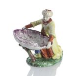 Menage in Form eines Türken mit Muschelschale