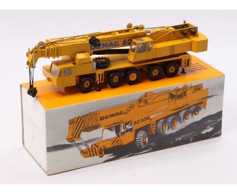 Conrad No.2081 1/50th scale diecast model of a Demag AC335 All Terrain Mobile Crane, yellow example with Demag livery, in the