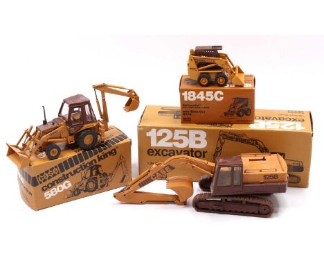 A Conrad 1/35 scale Case construction vehicle diecast group, to include a No. 2965 Case 125B excavator, a Conrad No. 5401 Cas