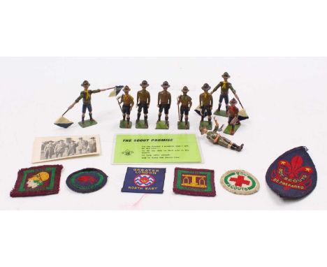 Collection of various lead hollowcast Britains Scout figures, to include marching with flag, kneeling with axe and others, to