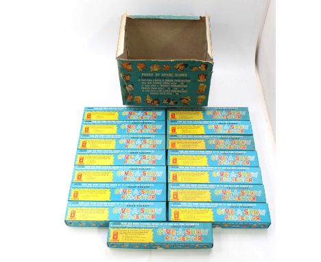 A Chad Valley circa 1960s trade box of 15 of 16 packs of story projector slides containing Bambi, Donald Duck, Noddy, Goofy, 