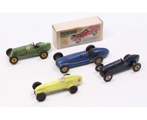 A collection of mixed media plastic, white metal and wooden racing cars to include a Penguin series 4 plastic racer, two Scam
