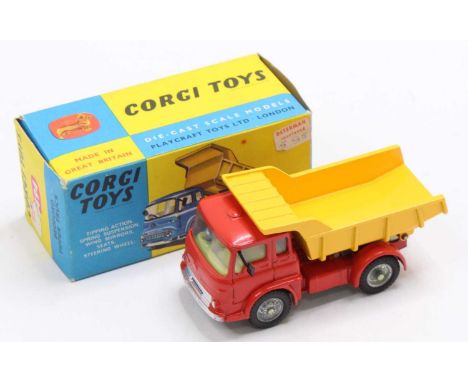 Corgi Toys No. 494 Bedford Tipper Truck, red cab and chassis with yellow tipper, sold in the original yellow &amp; blue card 