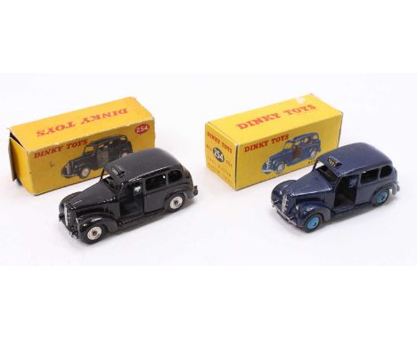 Dinky Toys boxed No. 254 Taxi group, 2 examples with the first in black, with dark grey interior &amp; base, and spun hubs, b