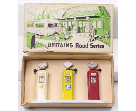 Britains Road Series No. 9681 Petrol Pump Set, comprising a Shell, a National Benzole, and an Esso Petrol pumps to a base, so