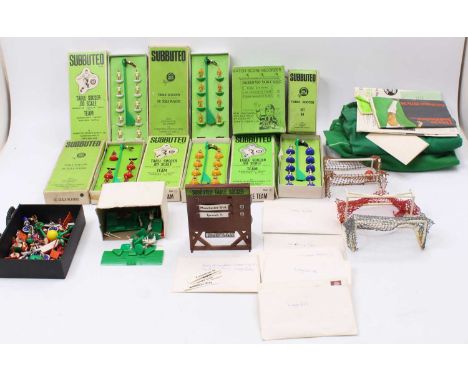 A small collection of vintage Subbuteo comprising 2x pitches, goals, match score recorder, and several boxed teams and partia