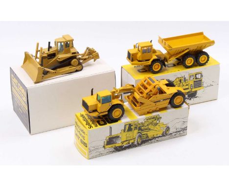 Three boxed 1/50 scale Caterpillar related earth moving construction vehicles including a NZG 298 Caterpillar D9N tractor, a 