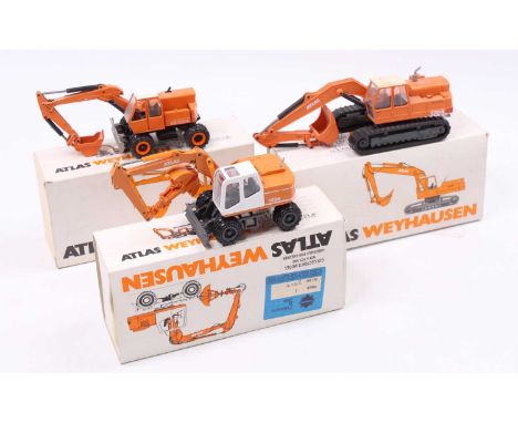 A collection of Atlas Conrad 1/50 scale diecast vehicles including an Atlas Wayhausen 4-wheel excavator, a Conrad No. 294 Atl