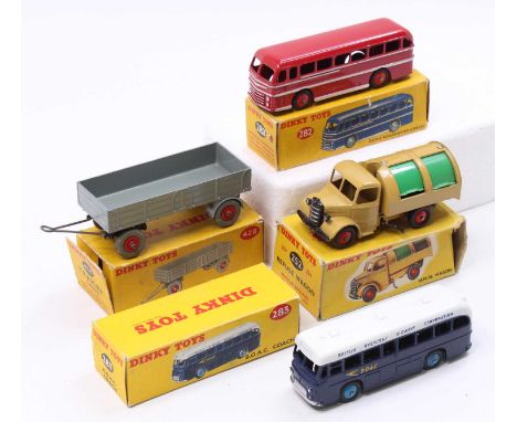 Dinky Toys boxed model group of 4 comprising No. 252 Bedford Refuse Wagon, No. 282 Duple Roadmaster Coach, No. 283 BOAC Coach