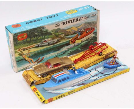 Corgi Toys Gift set No. 31 "Riviera set" comprising of Buick in metallic gold, fitted with wire wheels plus a Dolphin 20 cabi