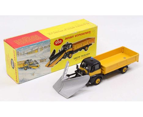 Dinky toys No. 958 Snowplough, comprising a black and yellow body with yellow Supertoys hubs and blue light, sold in the orig