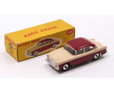 Dinky Toys No. 165 Humber Hawk, maroon lower body and roof, with light beige upper body, spun hubs, sold in the original corr