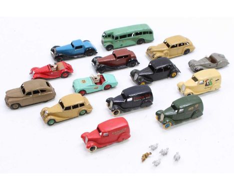 A tray of play-worn, repainted and recast Dinky Toys, with examples including No. 39D Buick Saloon, No. 111 Triumph TR2 Sport