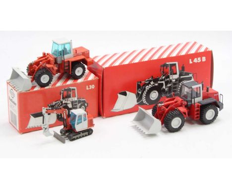 A Conrad, Gama, and NZG 1/50 scale O&amp;K boxed construction vehicle group to include a Conrad No. 2429 L45B wheel loader to