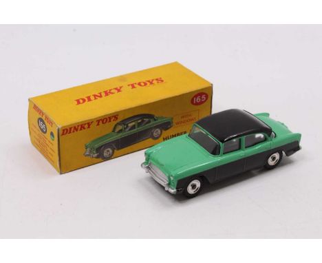 Dinky Toys No. 165 Humber Hawk comprising light green and black body with spun hubs in the original correct colour spot box (