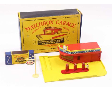 A Matchbox Lesney MG1 Garage, Showroom &amp; Service Station for Matchbox Toys comprising a yellow and red garage with wrap a