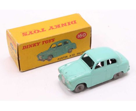 Dinky Toys No. 160 Austin A30 saloon comprising of turquoise body with grey plastic wheels in the original all-card picture s