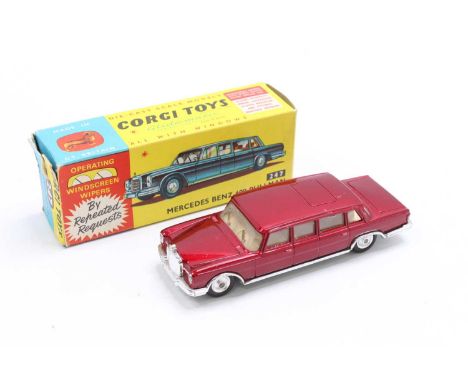Corgi Toys No. 247 Mercedes Benz 600 Pullman comprising of metallic red body with cream interior and spun hubs housed in the 