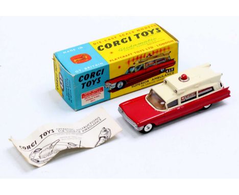 Corgi Toys No. 437 Superior Ambulance on Cadillac chassis comprising of red and cream body with brown interior and spun hubs,