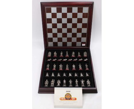 A Danbury Mint Doctor Who Mighty Battle between Good and Evil chess set, housed in the original wooden chess board box, conta