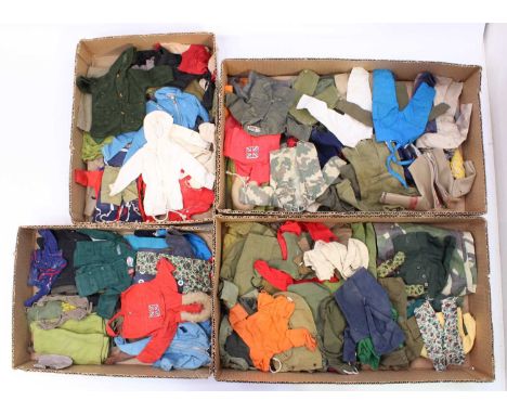 A large collection of vintage Palitoy Action Man clothing including various military uniforms, arctic clothing, coats, jacket