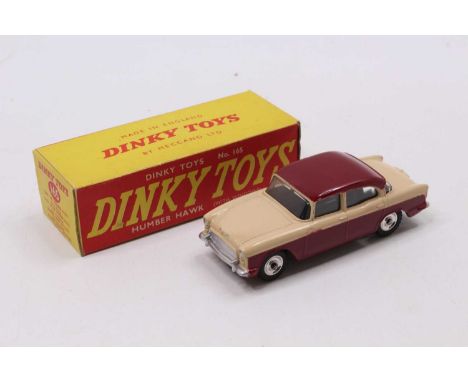 Dinky Toys No. 165 Humber Hawk, maroon lower body and roof, with light beige upper body, spun hubs, sold in the original all 