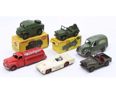 A small collection of mixed diecasts including a Dinky Toys No. 688 Field Artillery Tractor, No. 674 Austin Champ, a Tekno No